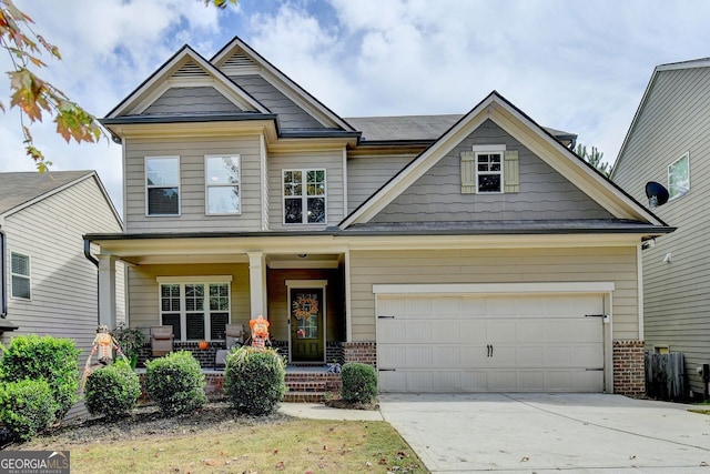 craftsman house featuring a garage and a porch