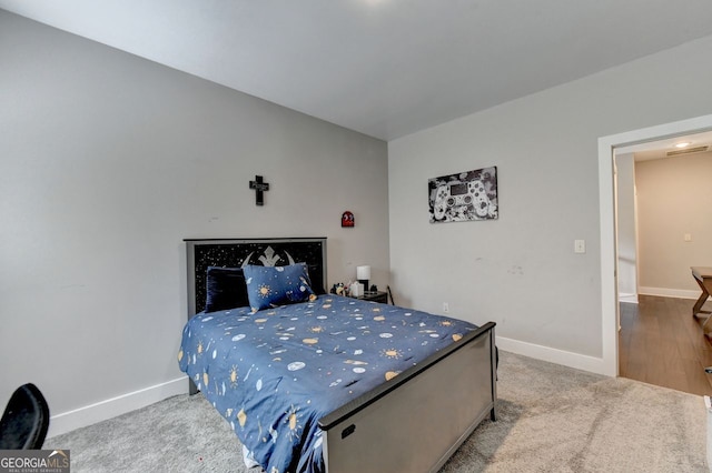 bedroom featuring light wood-type flooring