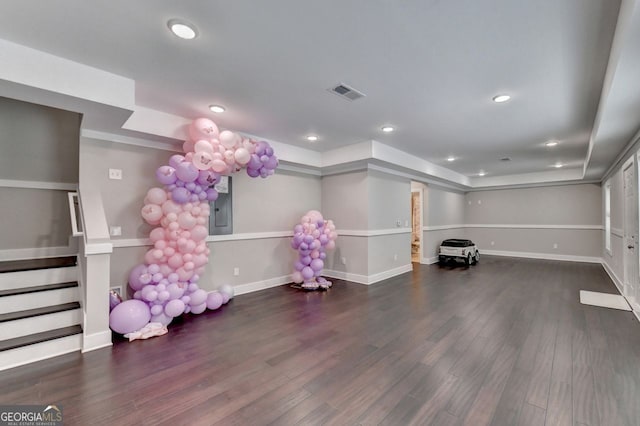 game room with dark hardwood / wood-style flooring