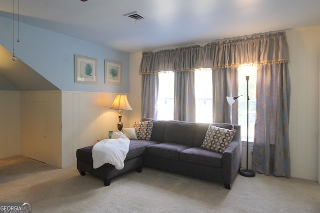 living room featuring light colored carpet