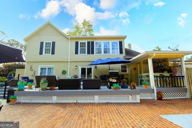 back of property featuring an outdoor hangout area