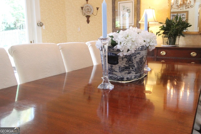 interior details featuring a chandelier