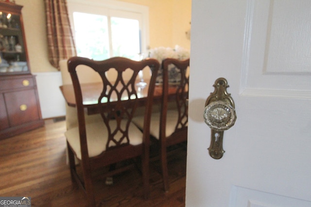 dining space featuring hardwood / wood-style flooring