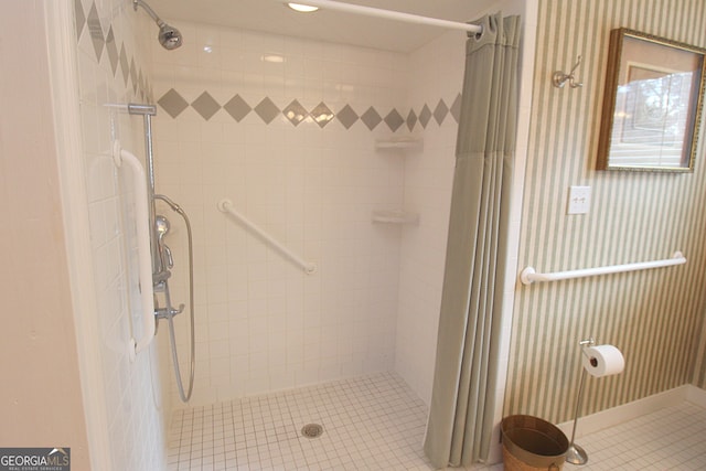 bathroom featuring tile patterned floors and a shower with curtain