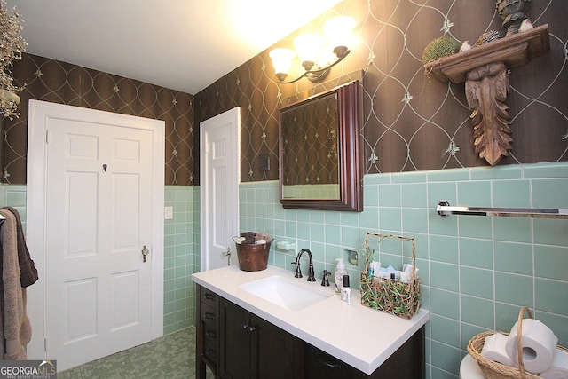 bathroom featuring tile walls and vanity