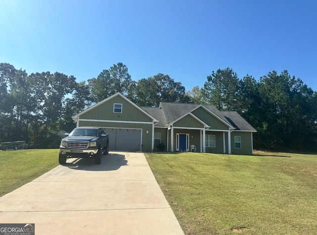 craftsman-style home with a front yard and a garage