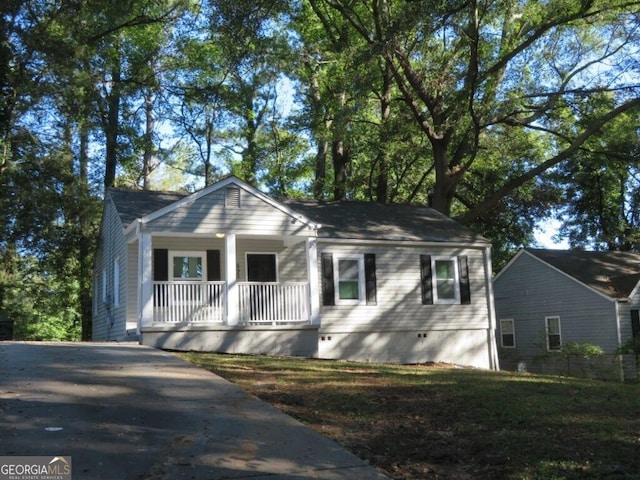 bungalow-style house featuring crawl space and covered porch