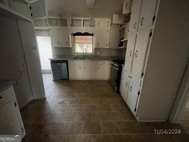 kitchen with sink, white cabinetry, and stainless steel appliances