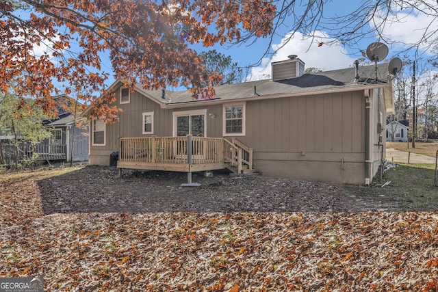 rear view of house with a deck