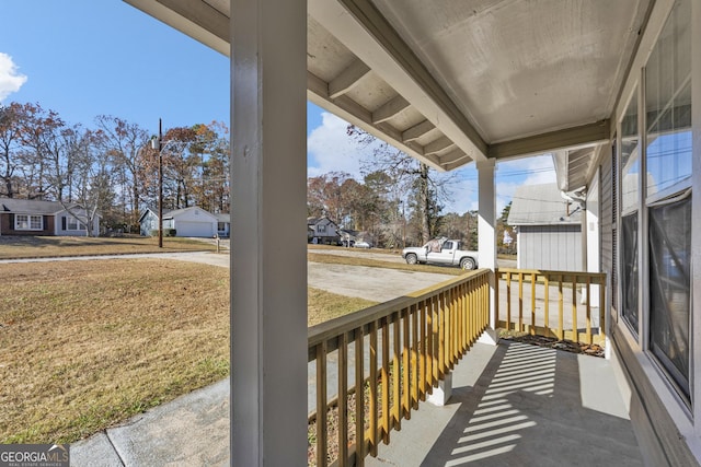 balcony featuring a porch