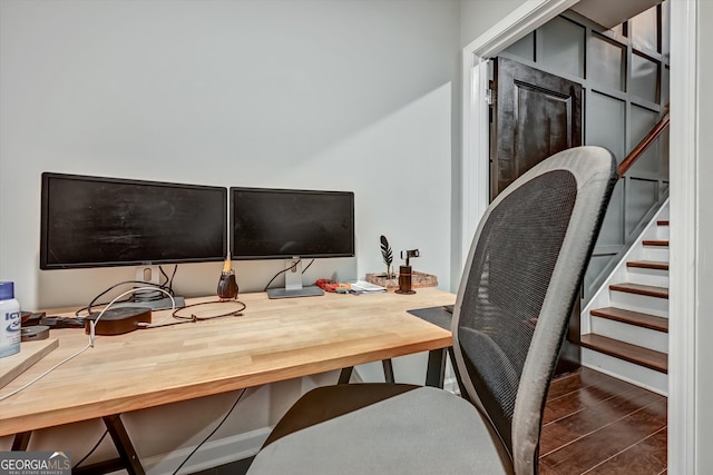 home office with hardwood / wood-style floors