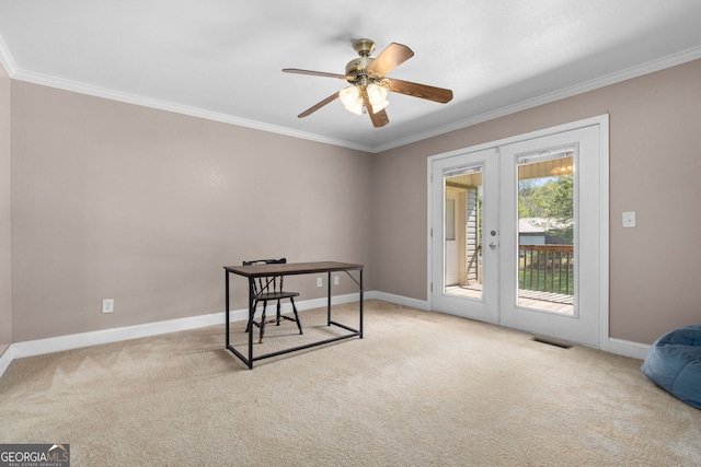 carpeted home office with ornamental molding, ceiling fan, and french doors