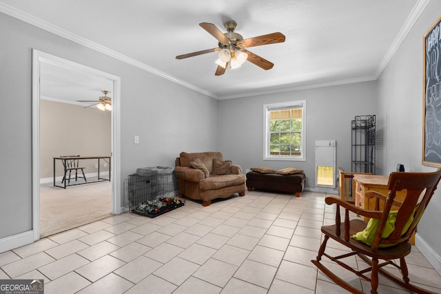 sitting room featuring crown molding, light colored carpet, and ceiling fan