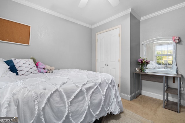 bedroom featuring light carpet, a closet, ornamental molding, and ceiling fan