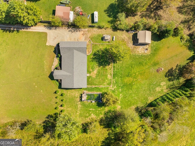 birds eye view of property featuring a rural view