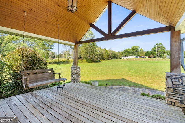 deck featuring a lawn