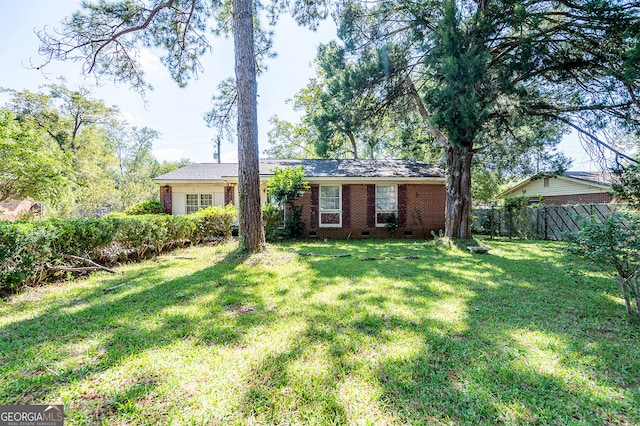 view of front of property with a front lawn