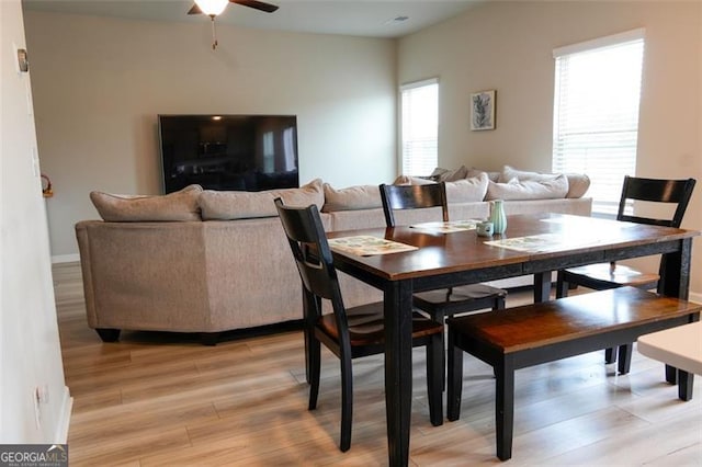 dining space featuring ceiling fan, plenty of natural light, and light hardwood / wood-style flooring