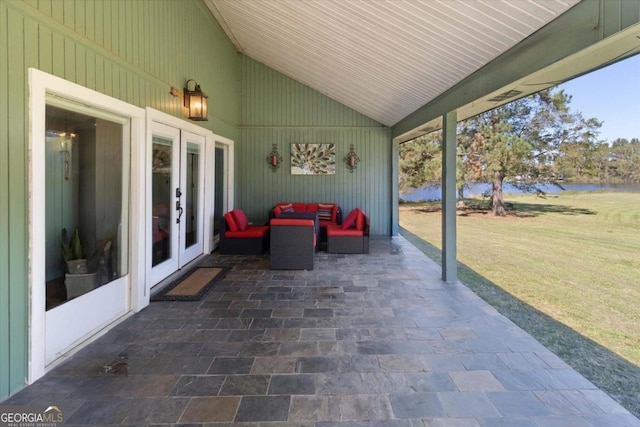 view of patio with a water view, an outdoor hangout area, and french doors