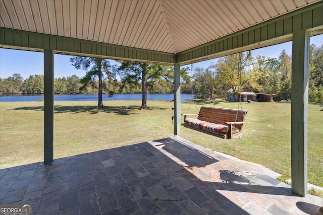 view of patio featuring a water view