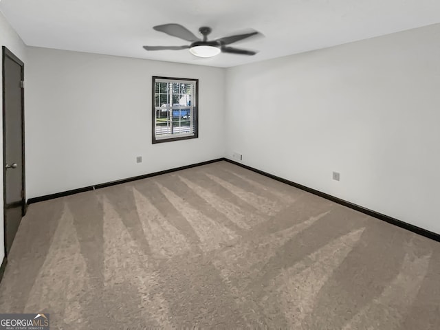 unfurnished bedroom featuring ceiling fan