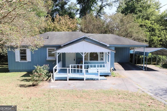 view of front of house with a front yard and a wooden deck