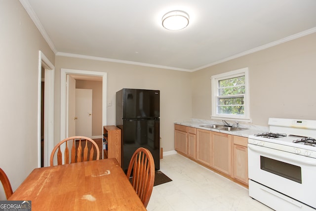 kitchen featuring light brown cabinets, white gas range, black fridge, sink, and crown molding