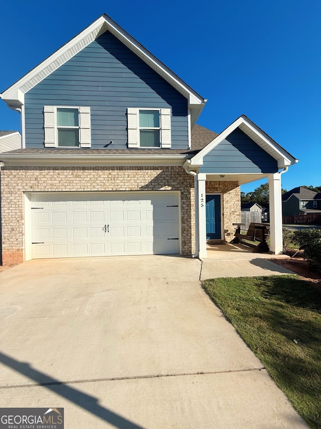 view of front of home with a garage