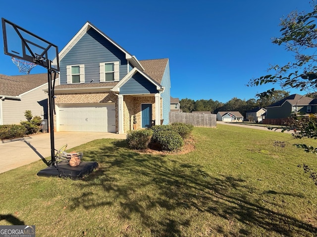 view of front facade with a front yard and a garage