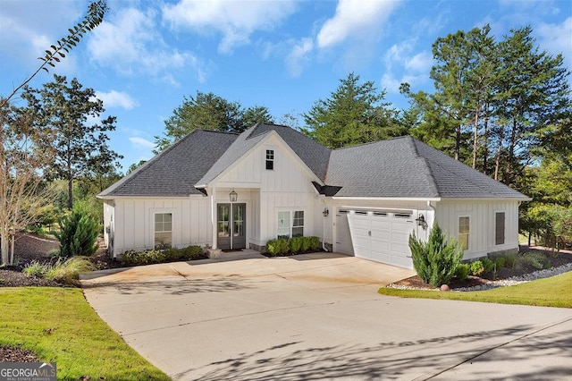 modern farmhouse featuring a garage