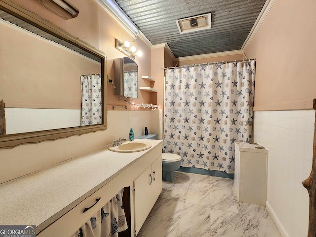 bathroom featuring crown molding, vanity, a wall mounted air conditioner, and toilet