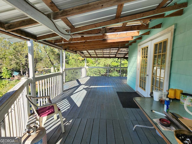 wooden terrace featuring french doors