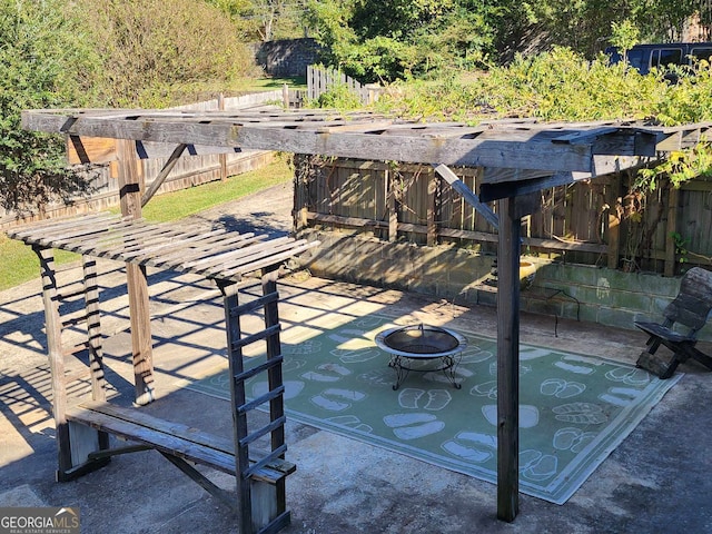 view of patio / terrace featuring a fire pit