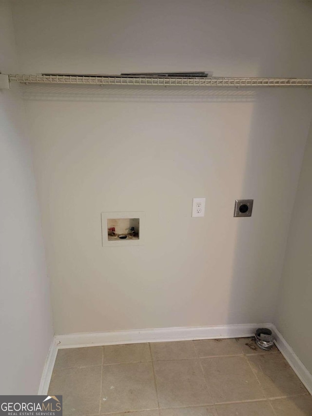 clothes washing area featuring washer hookup, hookup for an electric dryer, and light tile patterned floors