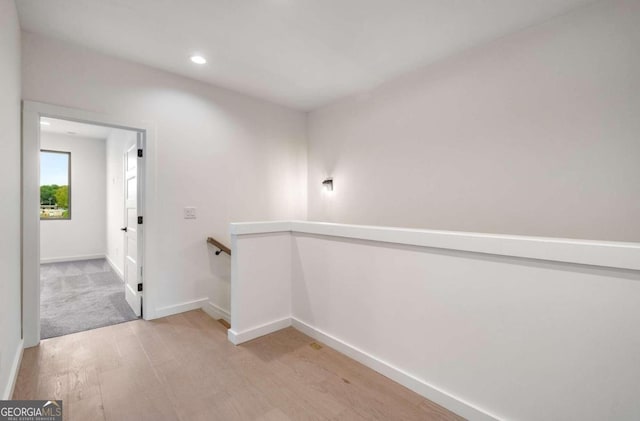 hallway with light wood-type flooring