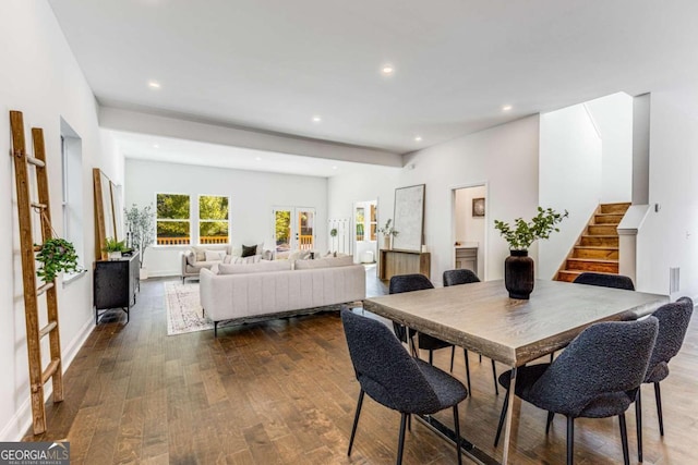 dining space featuring recessed lighting, stairway, baseboards, and dark wood finished floors