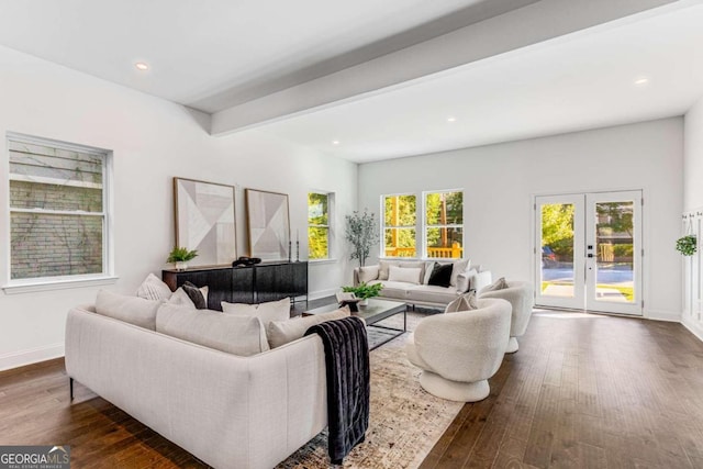 living room featuring baseboards, dark wood-style floors, beamed ceiling, recessed lighting, and french doors