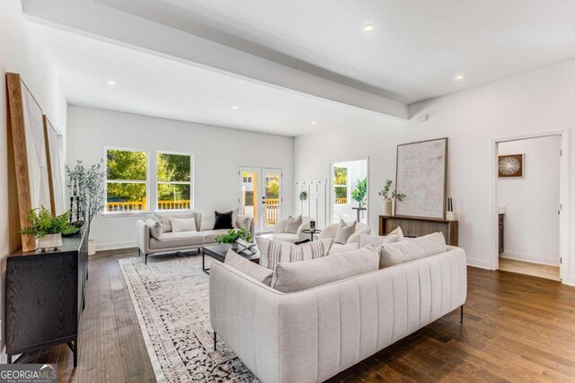 living room with french doors and dark hardwood / wood-style floors