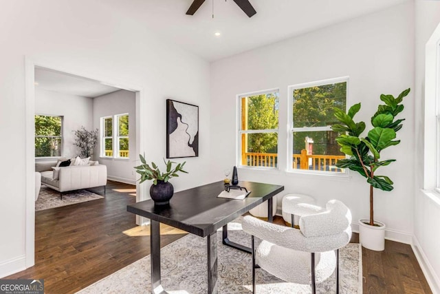 home office with ceiling fan, recessed lighting, hardwood / wood-style flooring, and baseboards