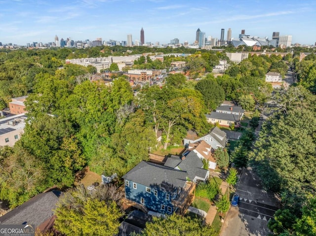 birds eye view of property with a city view