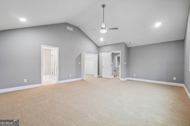 397 S Gordon Rd SW, Mableton, GA 30126 - unfurnished bedroom with high vaulted ceiling, light carpet, baseboards, connected bathroom, and a spacious closet