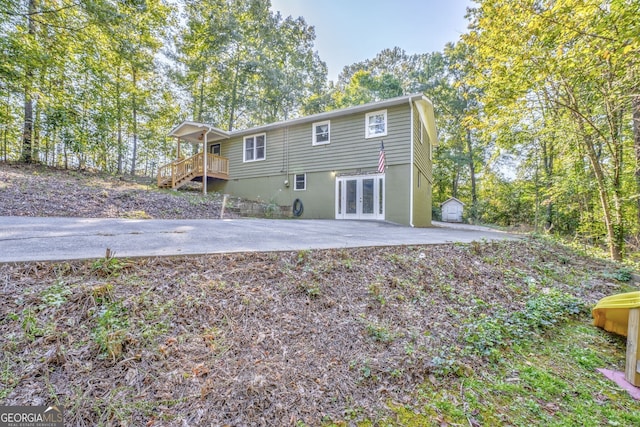 back of house featuring french doors and a patio area