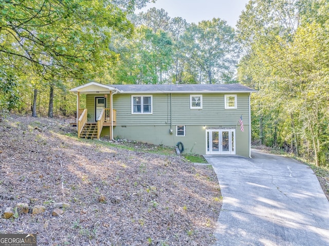 view of front of home featuring french doors and crawl space