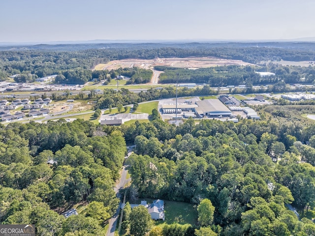 aerial view featuring a forest view