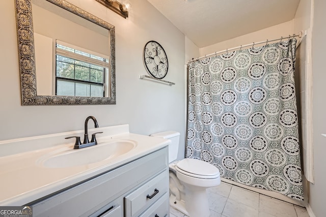 bathroom featuring a textured ceiling, a shower with shower curtain, toilet, tile patterned floors, and vanity