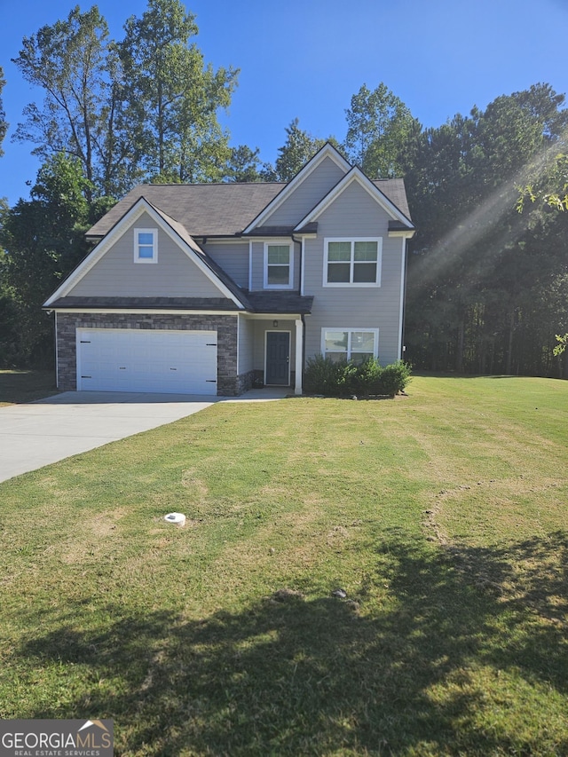 traditional-style house with concrete driveway and a front lawn