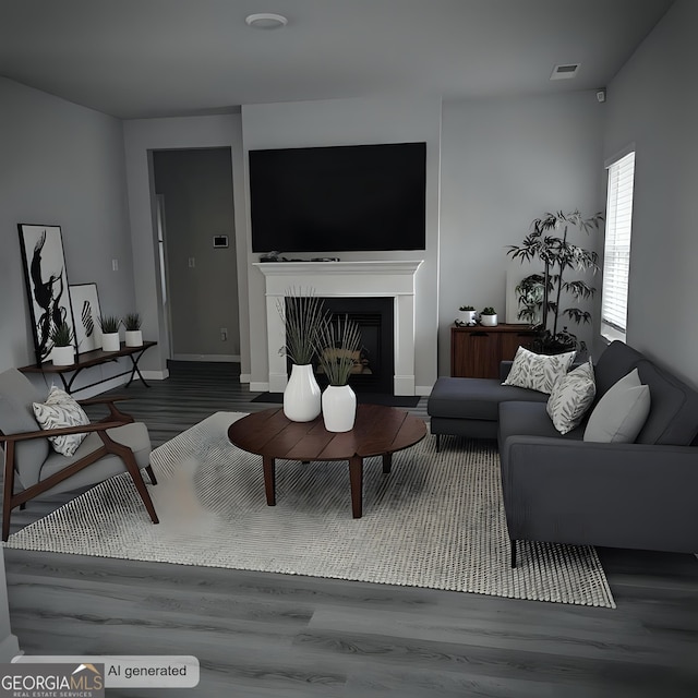 living room with a fireplace, wood finished floors, visible vents, and baseboards