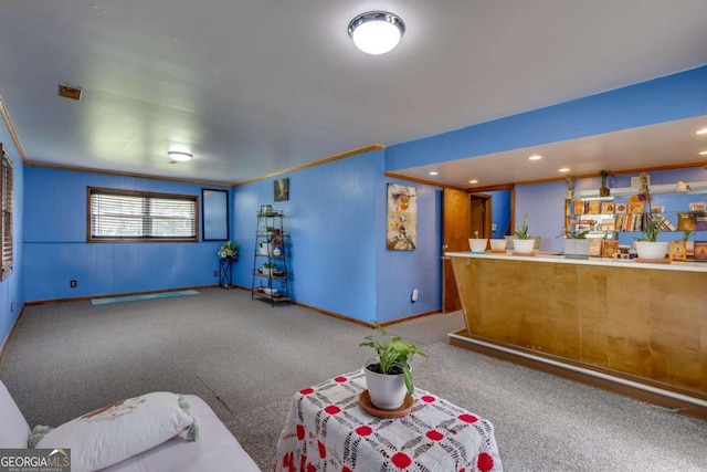 living room with crown molding and carpet flooring