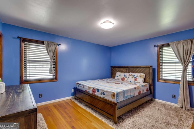 bedroom featuring hardwood / wood-style flooring