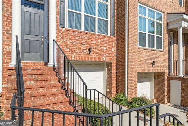 entrance to property featuring a garage